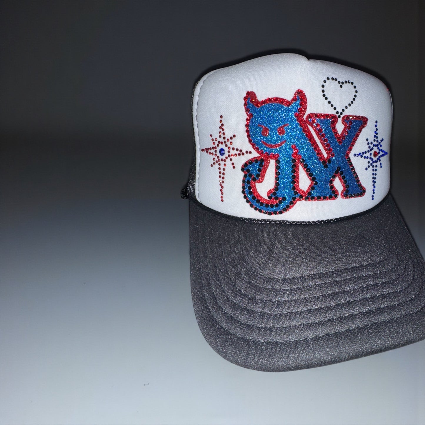 NX hat 💙❤️🖤🤍