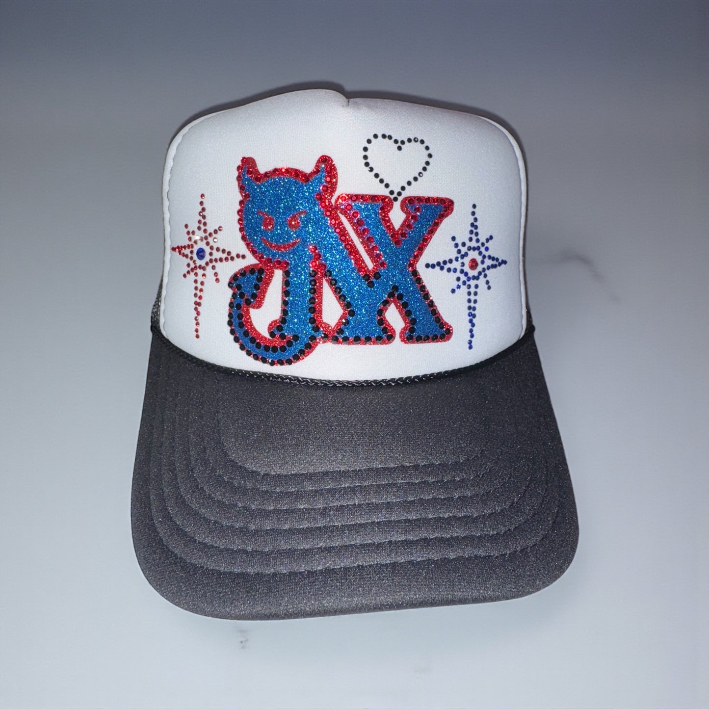 NX hat 💙❤️🖤🤍